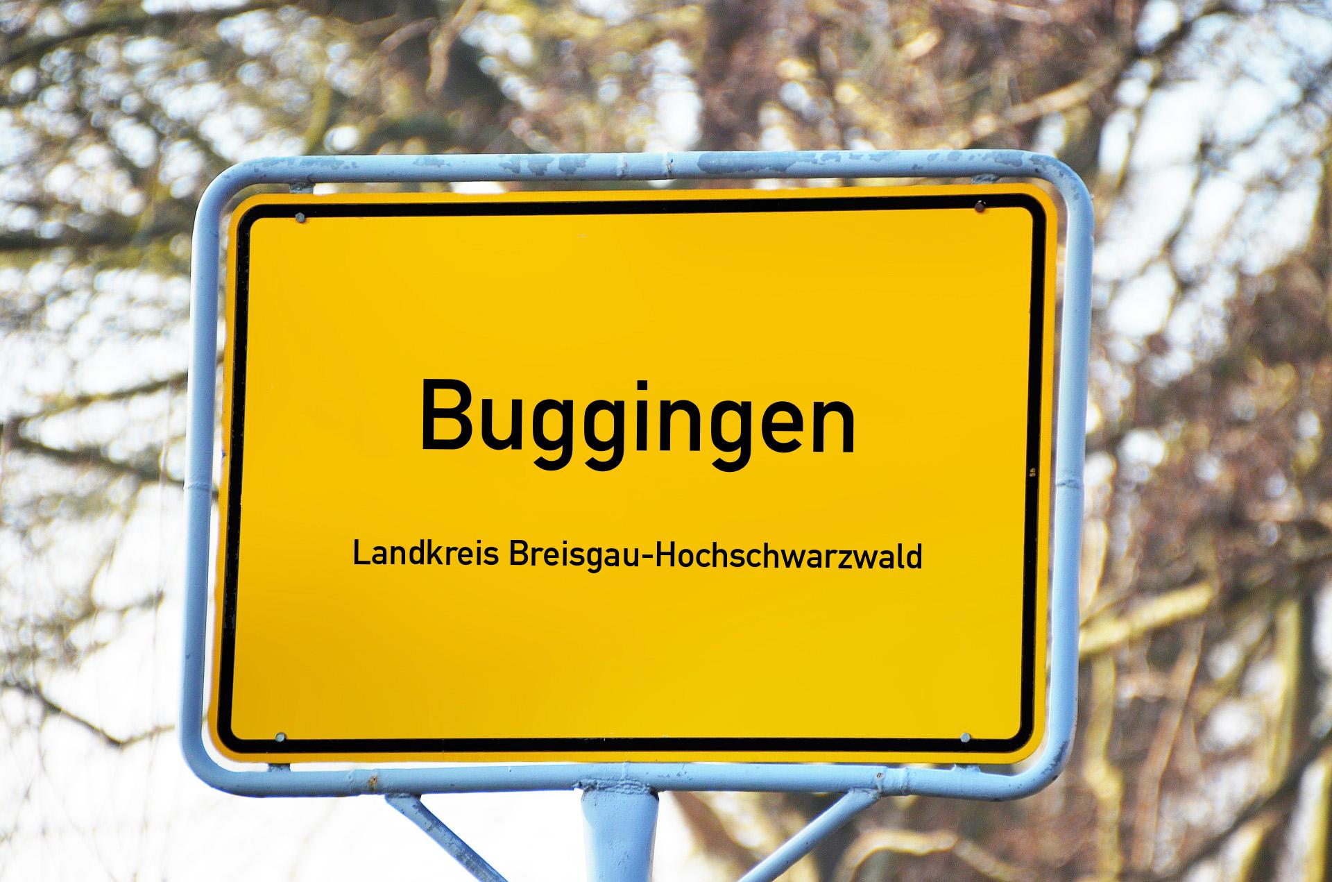 Ortsschild mit Aufschrift Buggingen