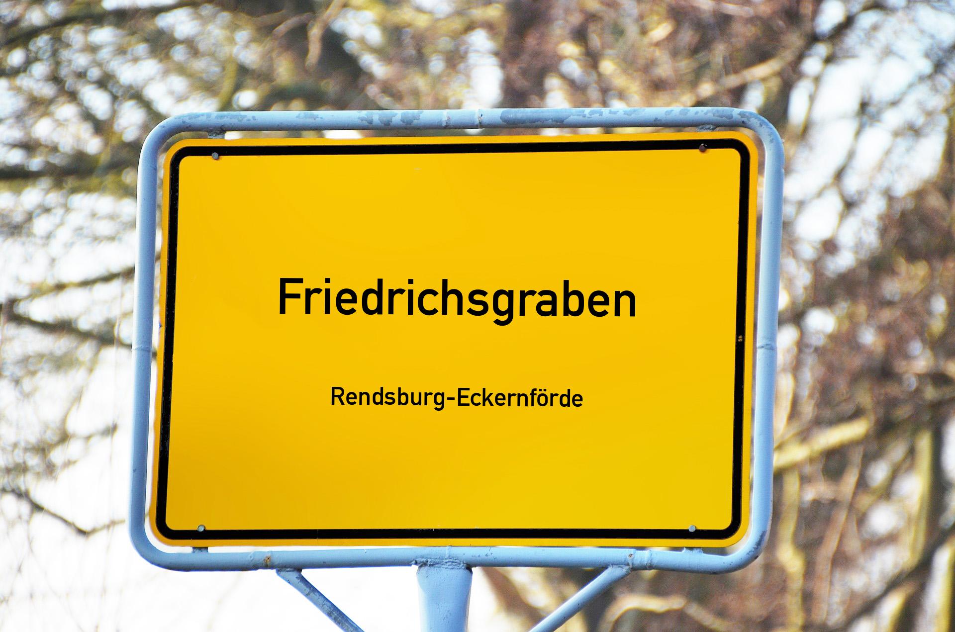 Ortsschild mit Aufschrift Friedrichsgraben