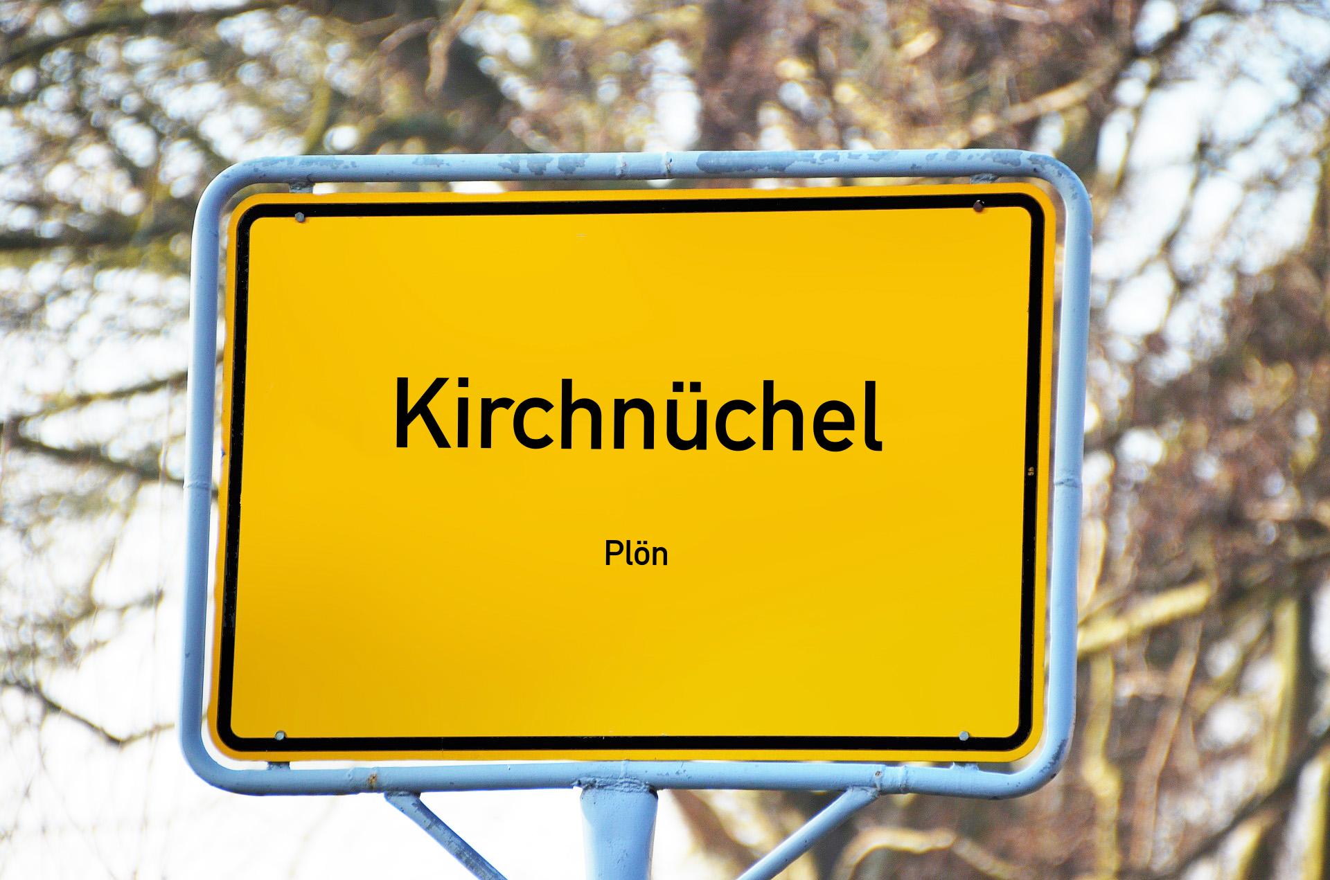 Ortsschild mit Aufschrift Kirchnüchel