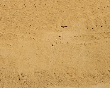 Gewaschener Mauersand in Beige von Hellerwald, gleichmäßig verteilt.