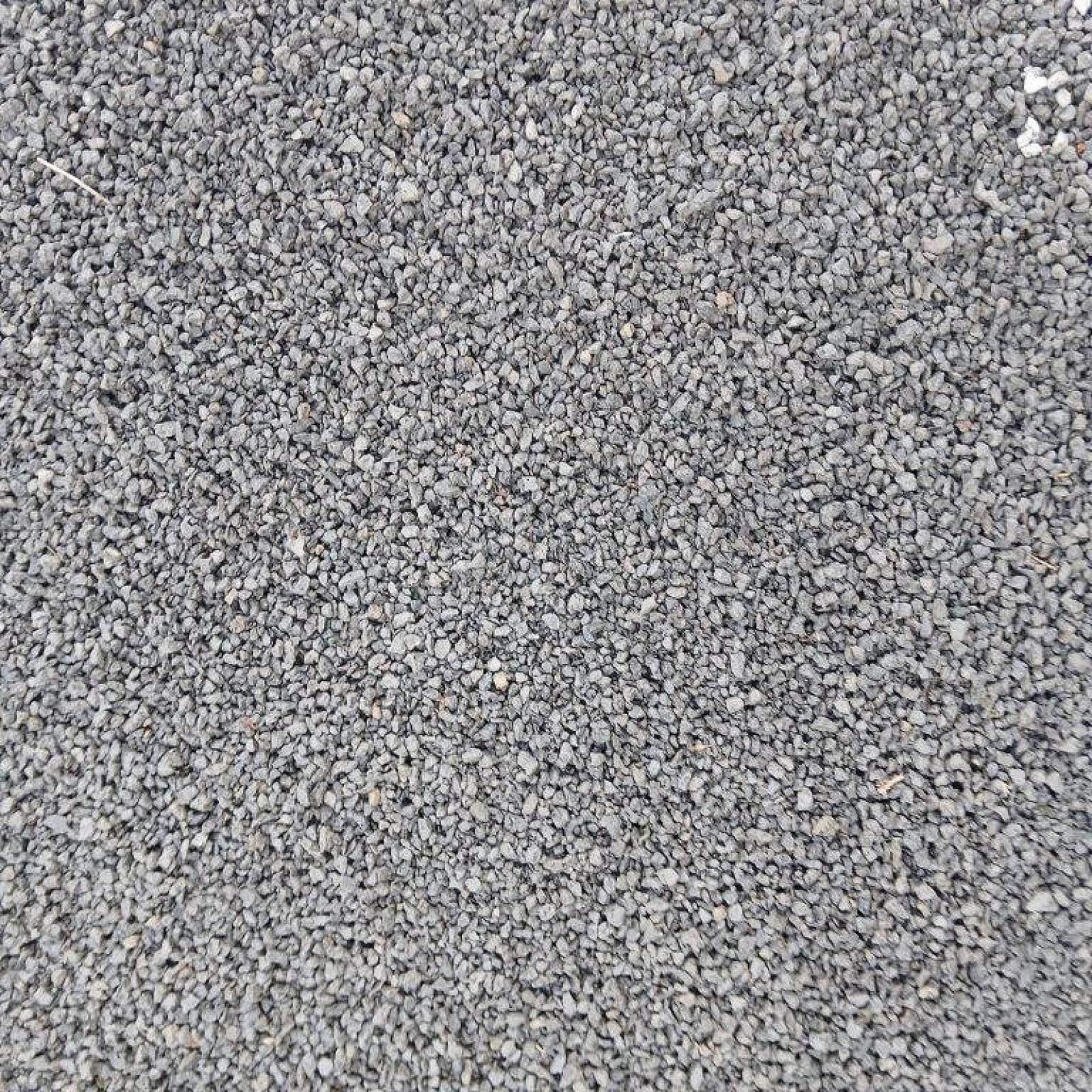 Grauwacke Mineralgemisch aus der Kollektion von Florikomp, kompakte graue Kieselsteinstruktur.