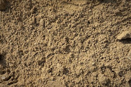 Gewaschener Sandhaufen, beige, gleichmäßig verteilt.