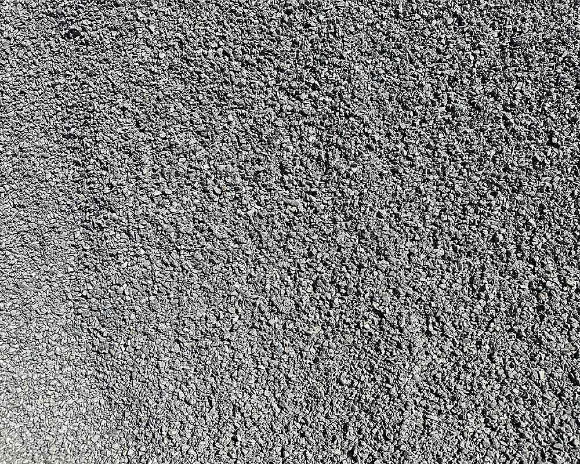 Grauer Pflastersplitt der Körnung 2-5 mm der Marke Naturstein + Recycling Winfried Beiler GmbH.