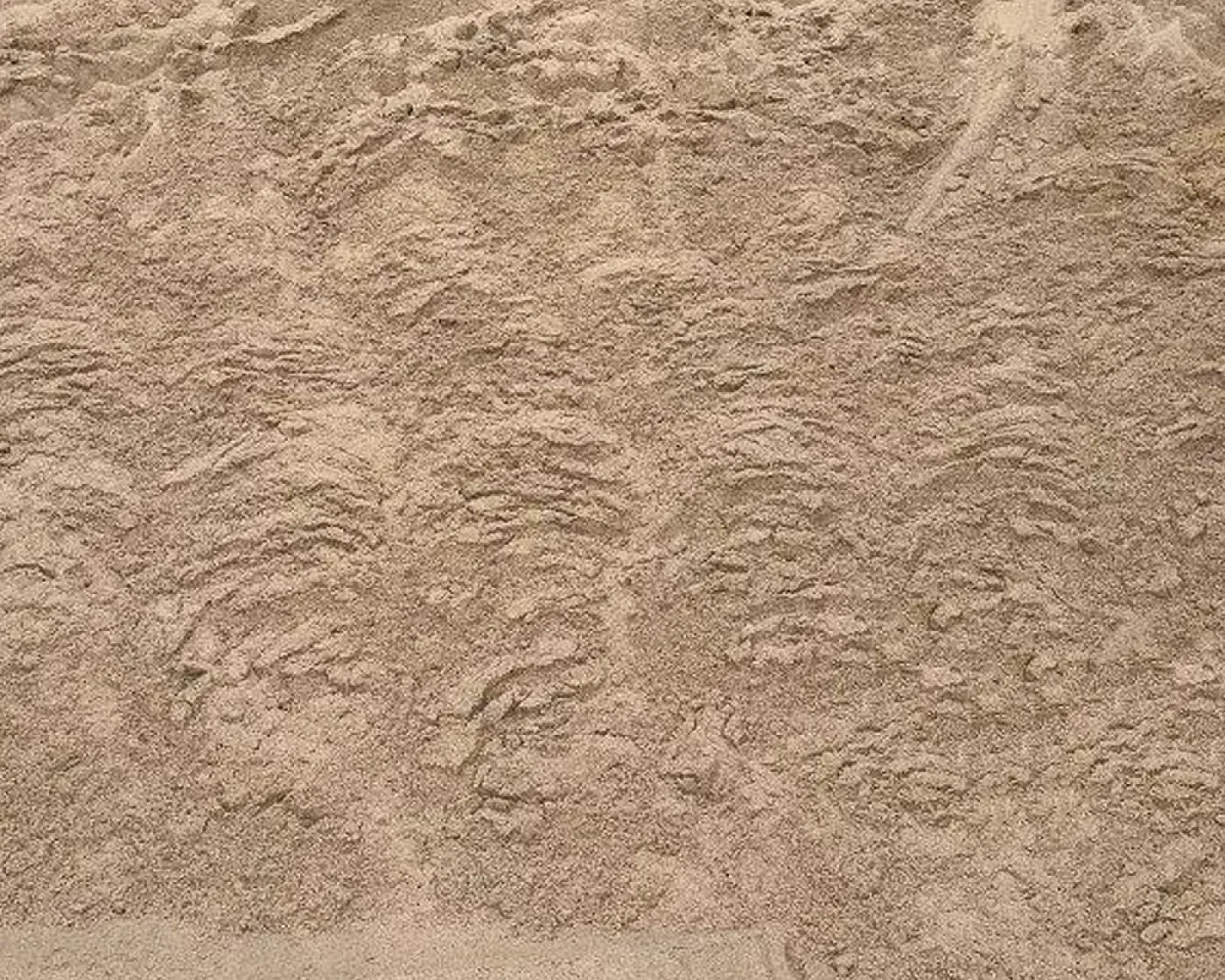 Beigefarbene Sandstruktur mit gewaschener, körniger Textur.